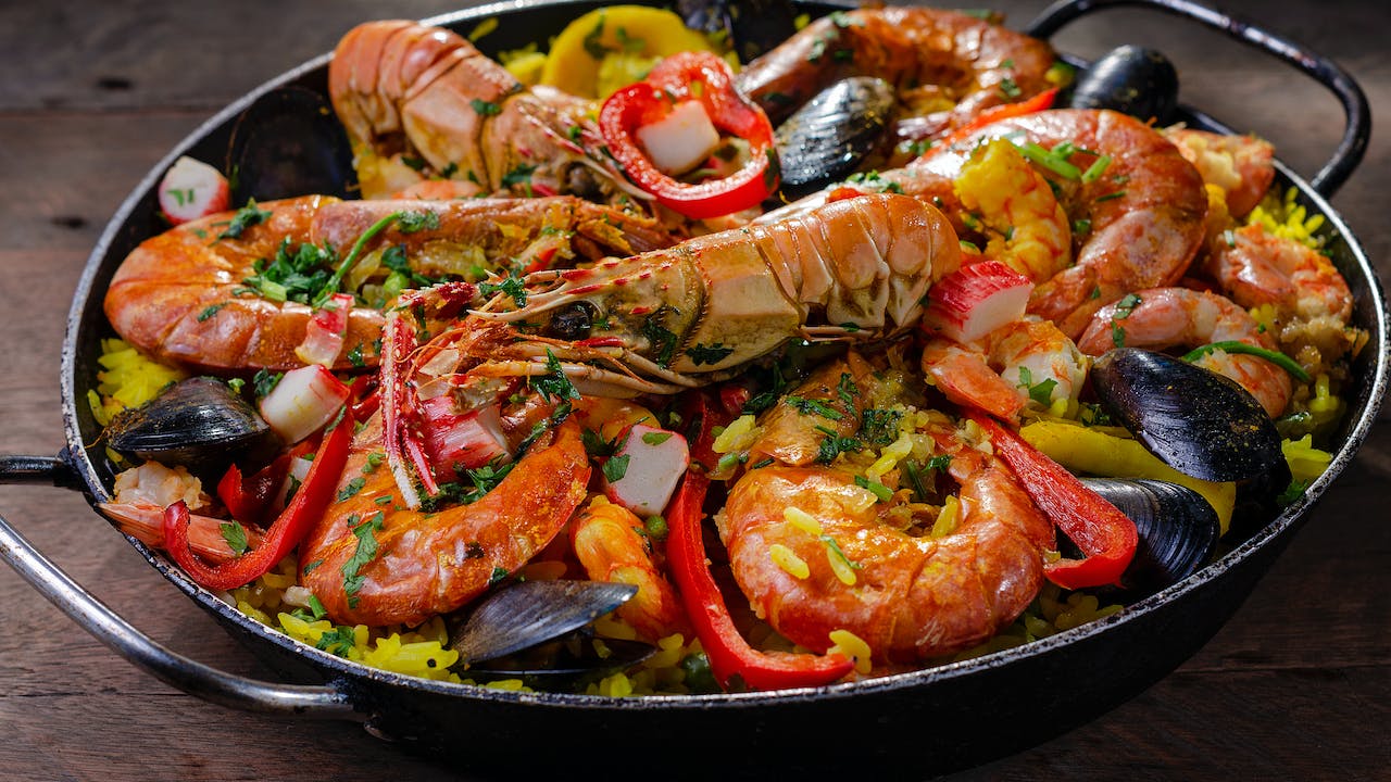 Costa Adeje include fresh seafood paella